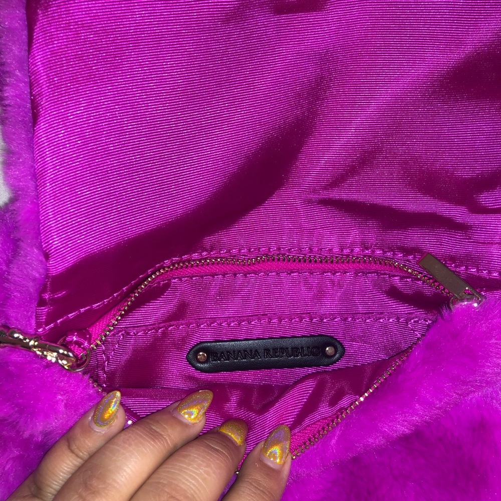 Pink faux fur wristlet